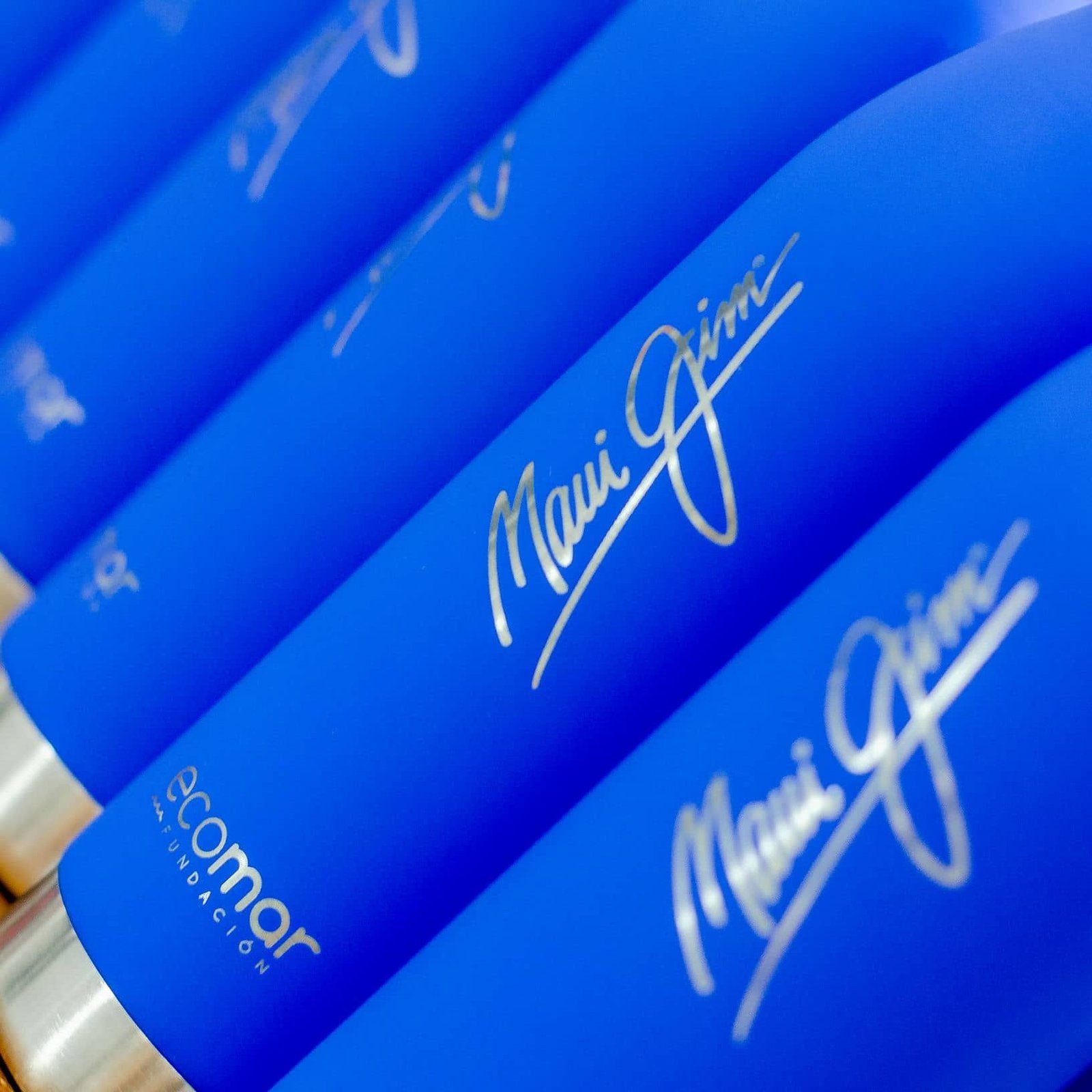 Grabado de botellas térmicas para MAUI JIM Y ECOMAR, IDEÁTICA Madrid